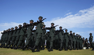 Sri Lankan army soldiers prepare to march during a rehearsal ahead of the country's Independence Day ceremony in Colombo. (AP)