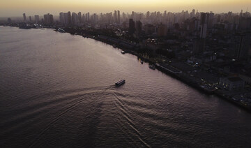 The sun rises over the bay of the Guama River in Belem, Brazil, Aug. 7, 2023. (AP)