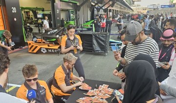 Racing fans meet Formula E drivers at autograph session