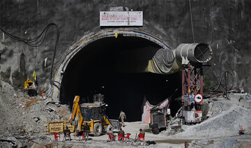 Rescuers search for eight trapped in India tunnel collapse