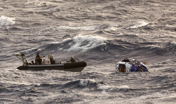 Australian navy rescues adventurer who hit a cyclone while rowing across the Pacific Ocean