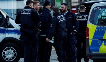 Police officers work at the site where a car drove into a crowd, in Mannheim, Germany, March 3, 2025. (Reuters)