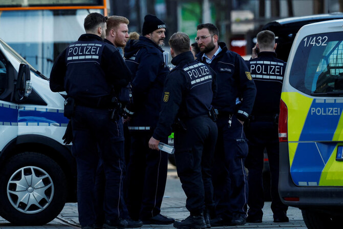 Police officers work at the site where a car drove into a crowd, in Mannheim, Germany, March 3, 2025. (Reuters)