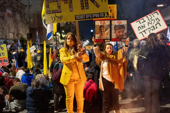 Israelis take part in a protest calling for the release of the hostages held in the Gaza Strip by Hamas, in Jerusalem.