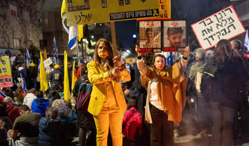 Israelis take part in a protest calling for the release of the hostages held in the Gaza Strip by Hamas, in Jerusalem.