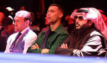 Boxing - Anthony Joshua v Otto Wallin - Conor McGregor, Cristiano Ronaldo & Turki Alalshikh are seen in the stands. (REUTERS)